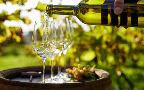 white wine being poured